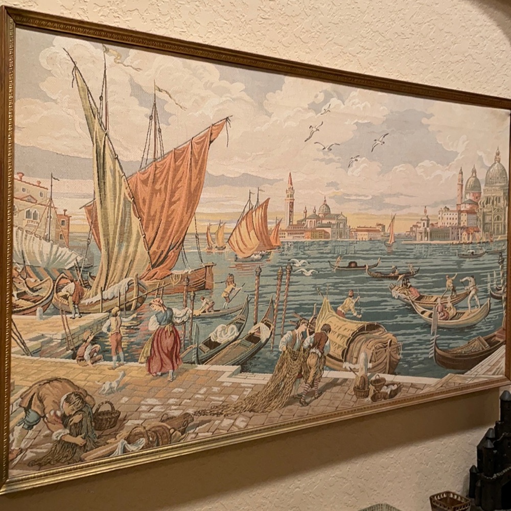 Needlepoint artwork that is framed.